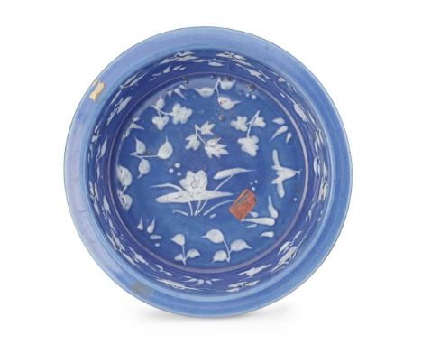 SLIP-DECORATED BLUE-AND-BROWN-GLAZED BASIN  QING DYNASTY, 18TH-19TH CENTURY 清 灑藍地飾堆白加褐釉折沿盆 of slightly tapered cylindrical fo