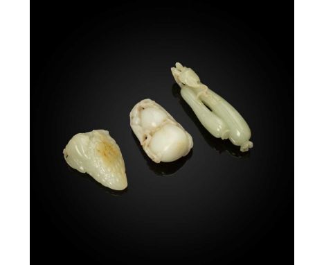 GROUP OF THREE JADE PENDANTS QING DYANSTY, 18TH-19TH CENTURY 清 各式玉珮（共三件） comprising: a pale celadon pendant in the form of tw