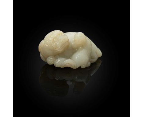 WHITE JADE CARVING OF A LION DOG AND CUB QING DYNASTY, 18TH CENTURY 清 白玉雕祥獅帶子擺件 carved in the round with a female lion dog an