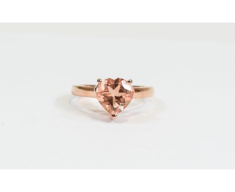 Blush Pink Quartz Heart Shaped Ring, a solitaire of 3.75cts of peachy blush pink coloured quartz, cut in a heart shape and se