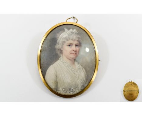 18thC Good Quality Hand Painted Portrait Miniature of a lady wearing a white dress and bonnet. circa 1780 within a gold colou