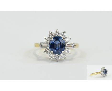 18ct Yellow Gold Set Sapphire and Diamond Cluster Ring flower head setting the central sapphire surrounded by brilliant cut d