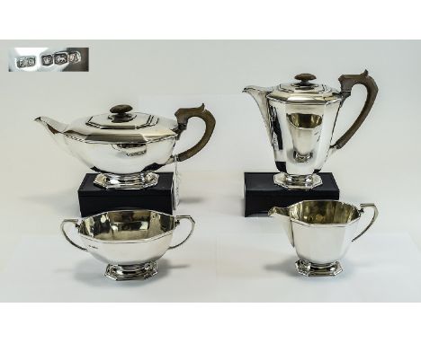 George VI 4 Piece Silver Tea Service, Art Deco lines. Hallmark Sheffield 1943, Makers F.C. Water Jug - 7.75 Inches High. Teap