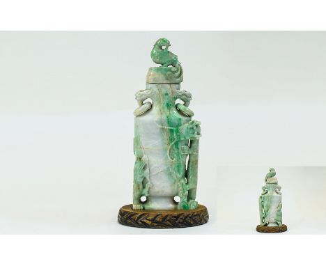Chinese Qing Dynasty Carved Jade Vase And Cover Twin Ring Handles. The Carved Jade Cover In The Form of a Mythical Bird, The 