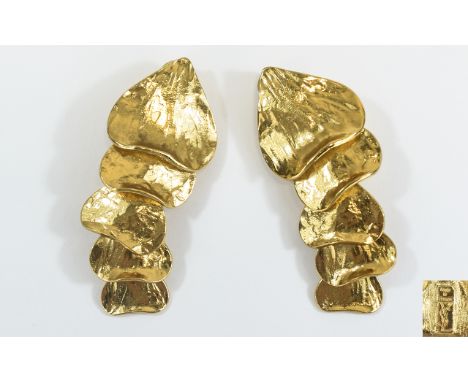 Yves Saint Laurent Vintage Earrings Clip on earrings in gold tone metal. Articulated statement long drop earrings featuring t