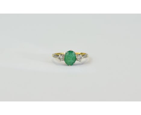 18ct Gold Set Emerald and Diamond 3 Stone Ring. The Central Emerald Flanked by Diamonds. Fully Hallmarked. Ring Size - P-R. 