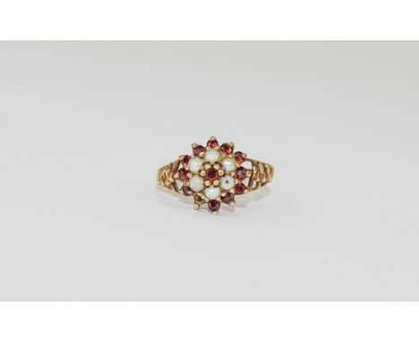 A Ladies Vintage 9ct Gold Set Garnet and Seed Pearl Cluster Ring. Fully hallmarked. Ring size P. 3.1 grammes.