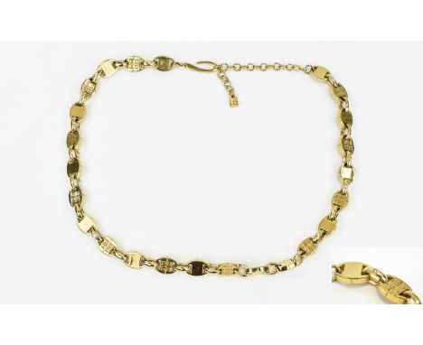 Givenchy Gold Tone Necklace Vintage chunky statement necklace by Givenchy featuring designer stamped oval stations and crysta