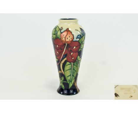 Moorcroft Modern Tubelined Vase. 'Tiger Lily' pattern, designer Nicola Slanley. Standing 8.25 inches high. First quality and 