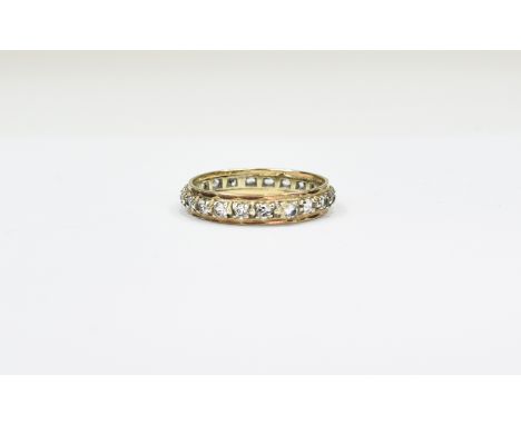 Ladies 9ct Gold and Diamond Set Full Eternity Ring set with over 26 diamonds est diamond weight 50 pts. Marked 3.75 9ct. Ring