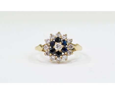 Ladies 9ct Gold Set Diamond and Sapphire Cluster Ring 'flower head design'. Fully hallmarked and est 30 pts of diamonds.