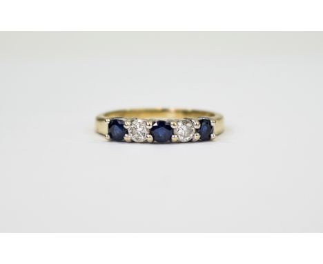 Ladies 9ct Gold set Sapphire and Diamond Dress Ring the diamonds of good colour and clarity, 20 points diamond weight, marked