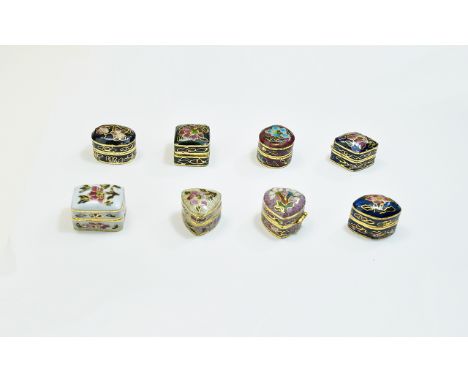 A Boxed Vintage Collection of 8 Small Enamel on Metal Hinged Lidded Pill Boxes of Various Shapes, Designs and Colours. Not Ma