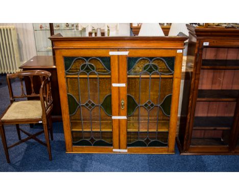 Large Light Wood Varnished Display Cabinet/Dresser 1920's cabinet in two parts with glazed doors. Top section features two gl