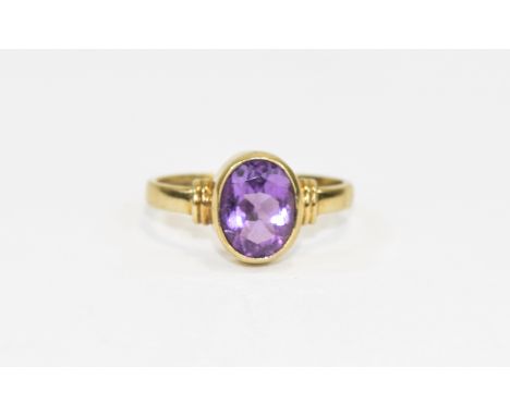 Ladies 9ct Gold Set Single Stone Oval Shaped Faceted Amethyst Ring the amethyst of excellent colour. Est weight 4ts. Fully ha