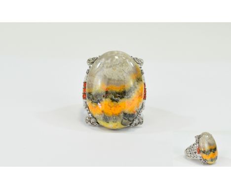 Bumble Bee Jasper and Fire Opal Statement Ring, a 34.5ct oval cut cabochon of the jasper named for the yellow, orange, black 