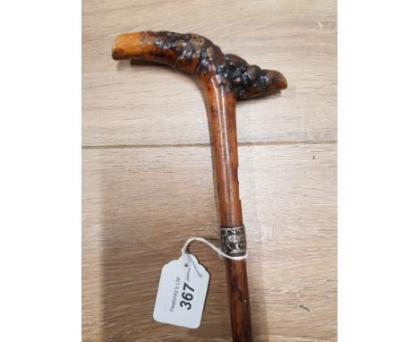 PARASOL HANDLE CONVERTED TO A WALKING STICK WITH HALLMARKED SILVER RIM