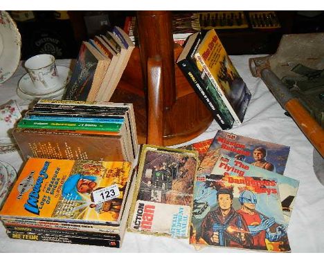 A quantity of science fiction sci-fi books including Doctor Who etc, also Action Man comics