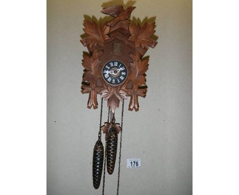 A carved black forest cuckoo clock