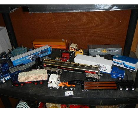 A quantity of unboxed diecast American trucks including Corgi, Matchbox, Franklin Mint and Ertl etc. ****Condition report****