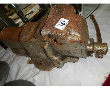 A 5" wooden bench vice