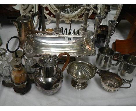A selection of silver plate including cruet set, triple candlestick etc
