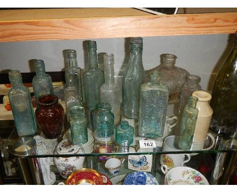 A quantity of vintage bottles