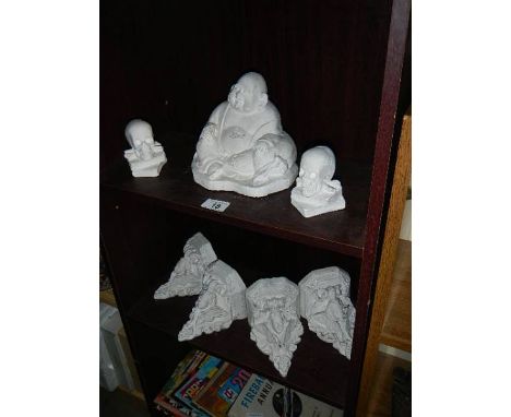 4 classical plaster shelf brackets plus a Buddah and 2 skulls Collect only