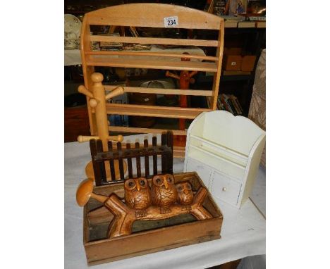 A mixed lot of wooden items including pipe rack, owls, etc collect only