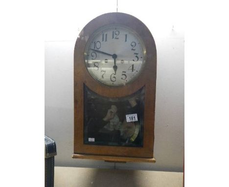 An old 8 day wall clock. (Collect only)