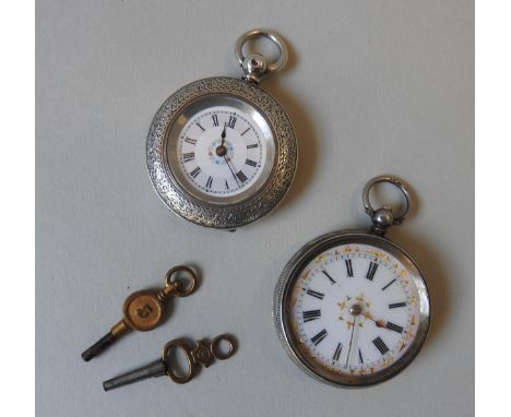 TWO CONTINENTAL LADIES SILVER FOB WATCHES, both in ornate engine turned cases, stamped with marks on the interior back plate,