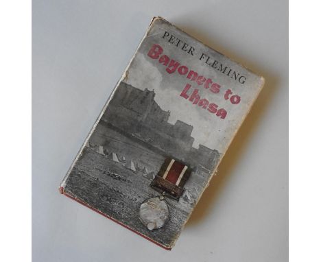 PETER FLEMING 'BAYONETS TO LHASA' FIRST EDITION, with dust jacket, and a hand written signed note by the author attached to t