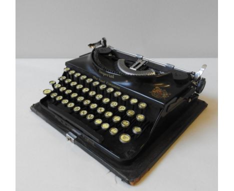 A VINTAGE IMPERIAL PORTABLE TYPEWRITER, circa 1950, ex Police issue, the case measuring 20 x 37 x 35 cm