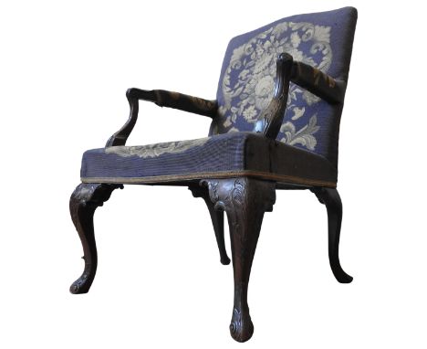 A GEORGE III MAHOGANY 'GAINSBOROUGH' TYPE OPEN ARMCHAIR, the back, arm rests and seat covered in a floral tapestry, with orna