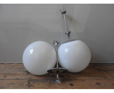 A PAIR OF RETRO PENDANT LIGHT FITTINGS, chromed metal fixtures with large globular white glass shades, approx 75 cm high 