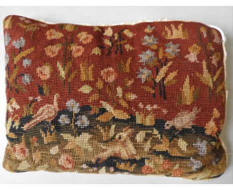 A LATE 18TH / EARLY 19TH CENTURY TAPETRY PANEL CUSHION, depicting rabbit and birds within a floral cornucopia, 27 x 36 cm 