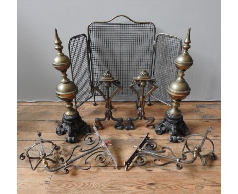A PAIR OF 19TH CENTURY BRASS &amp; CAST-IRON FIRE DOGS AND A PAIR OF ART NOUVEAU FIRE DOGS, along with a tri-fold spark guard