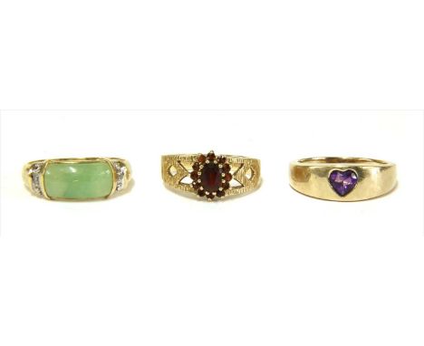 Three 9ct gold rings, to include a jade and diamond ring, a garnet cluster ring, and a heart shaped amethyst ring, 9.27g tota