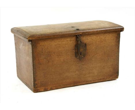 A Peruvian dome-topped trunk, 18th century, the camphor-lined lid opening to a candle box within, the front constructed with 