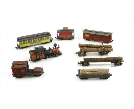 A Bachmann 'G' gauge garden rail Rocky Mountain Service 0.4.4. , together with rear guard's van, passenger carriage, goods wa