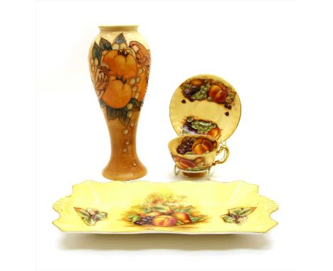 A Moorcroft vase in the Finches Ochre design , 28cm high, together with an Aynsley tray dish and a similar teacup and saucer 