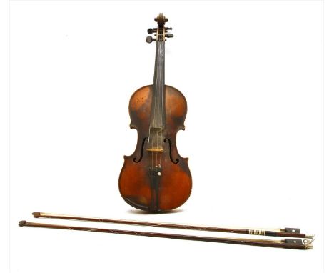 A late 19th century violin, labelled 'Antonius Stradivarius Cremonensis, faciebat anno 1721' probably German, overall grubby 