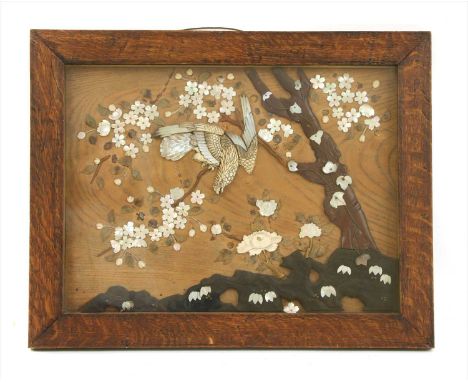 A Japanese mother of pearl and ivory panel, of a bird on a branch, with lacquer work tree trunk on a wood background. Oak fra