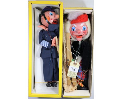 2 Pelham Puppets. Policeman (SM6). In dark blue uniform with helmet holding his truncheon. In a late style window box, minor 