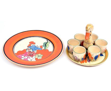 Clarice Cliff Crocus pattern novelty egg cup stand with 6x egg cups c.1930. Modelled as a duck with crocus egg cups. VGC, min