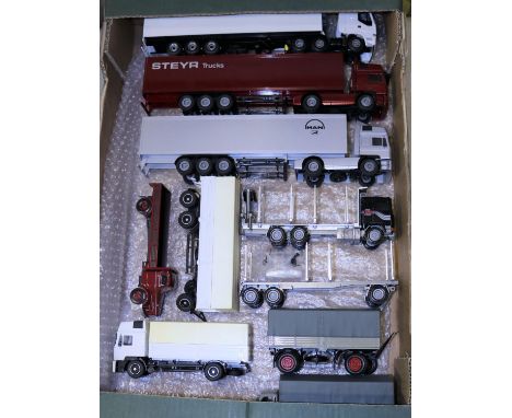 7 trucks by Conrad, Lion Car and Pauls Modelart. Volvo F-16 logging truck with drawbar trailer, both fitted with stanchions, 
