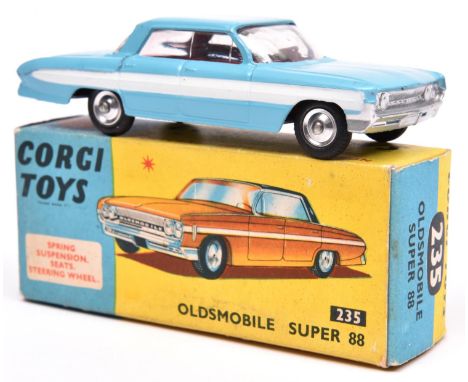 Corgi Toys Oldsmobile Super 88 (235). An example in light blue with white flash and red interior, dished spun wheels and blac