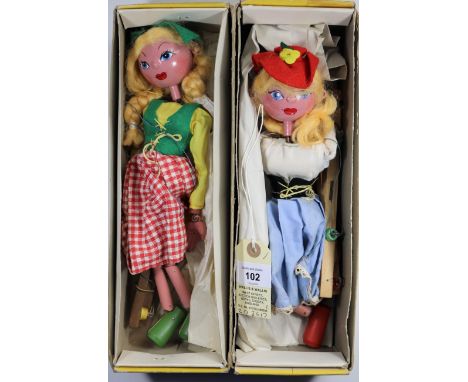 2 Pelham Puppets. Both Standard examples, one looks to be the Dutch girl and the other the gypsy girl, in green/yellow red/wh