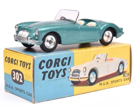 Corgi Toys M.G.A. Sports Car (302). Example in light metallic green with cream seats, late example with dished spun wheels an