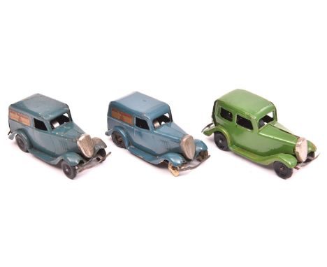 3x Tri-ang Minic post-war clockwork vehicles; a Ford Saloon (1M) in green with plastic wheels. 2x Ford Light vans (2M), both 